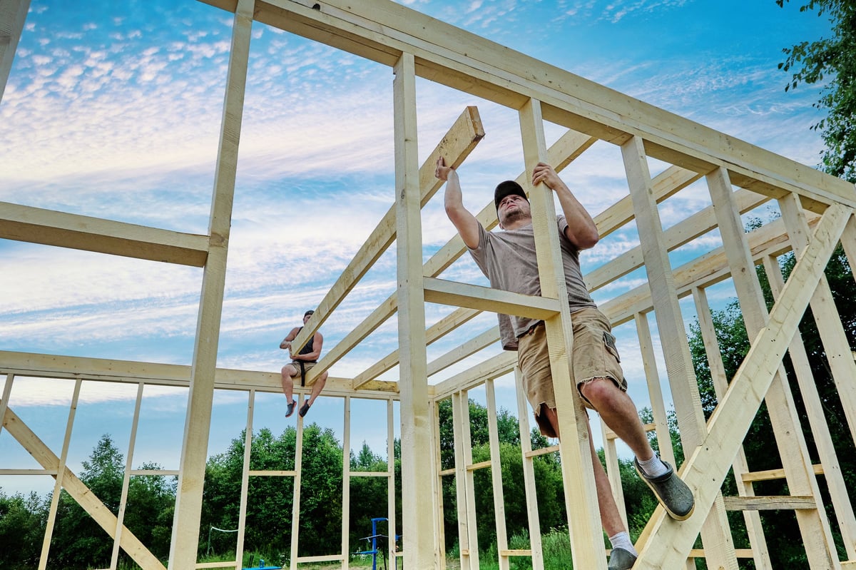 Construction crew framing a wood-frame home
